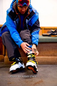 Backcountry skier Chris Davenport buckling in to Scarpa Maestrale boots.