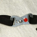 The buckle clasps on easily, requires finger dexterity to unhook. 