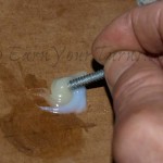 Mix up a slow-cure epoxy to bond the inserts.