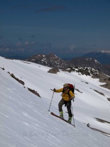 Matt J skinning up Lassen with Mt. Shasta behind.