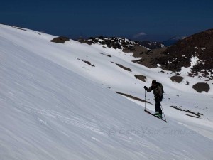 Mt. Shasta lingers beyond as Lynnzilla skins up Lassen's NE corner.