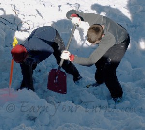 Two of Team MSR dig furiously to rescue a dummy buried 0.8m deep.