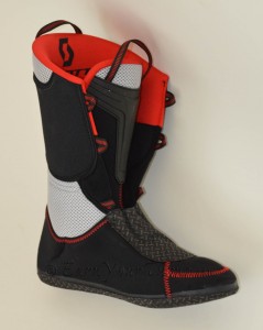 Liner is heat moldable, has a rubberized sole for grip, eyelets for laces, and a flex zone in back for better touring.